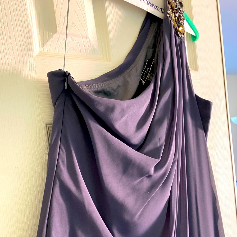 Purple one-shoulder gown